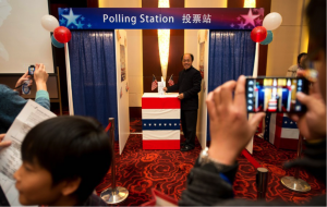 U.S. embassies have long hosted election watch parties to introduce foreign audiences to the American electoral process. In 2012, embassy guests in Beijing tried out a mock polling station. Ed Jones/AFP/Getty Images